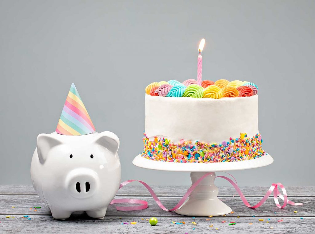 Piggy bank with birthday cake